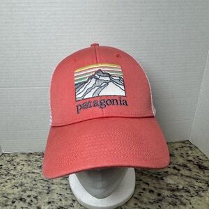 Patagonia coral Trucker hat with brand Mountain Patch